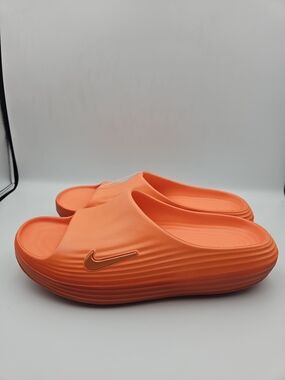 Nike Orange Slide Sandals with Gold Swoosh